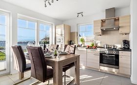Neu Beach House - Sonnenterasse, Wellnessbad mit Sauna, Kamin, Dachterrasse, Hafenblick